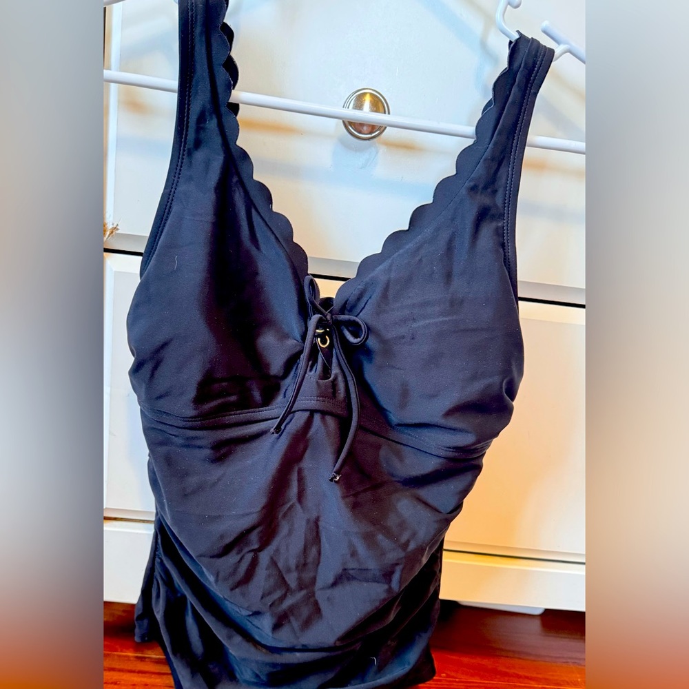 Worn once! Black one piece with tie in the front!